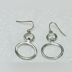 Sterling silver dangle earrings, mint condition. Measures 1.5” x 1.5”.